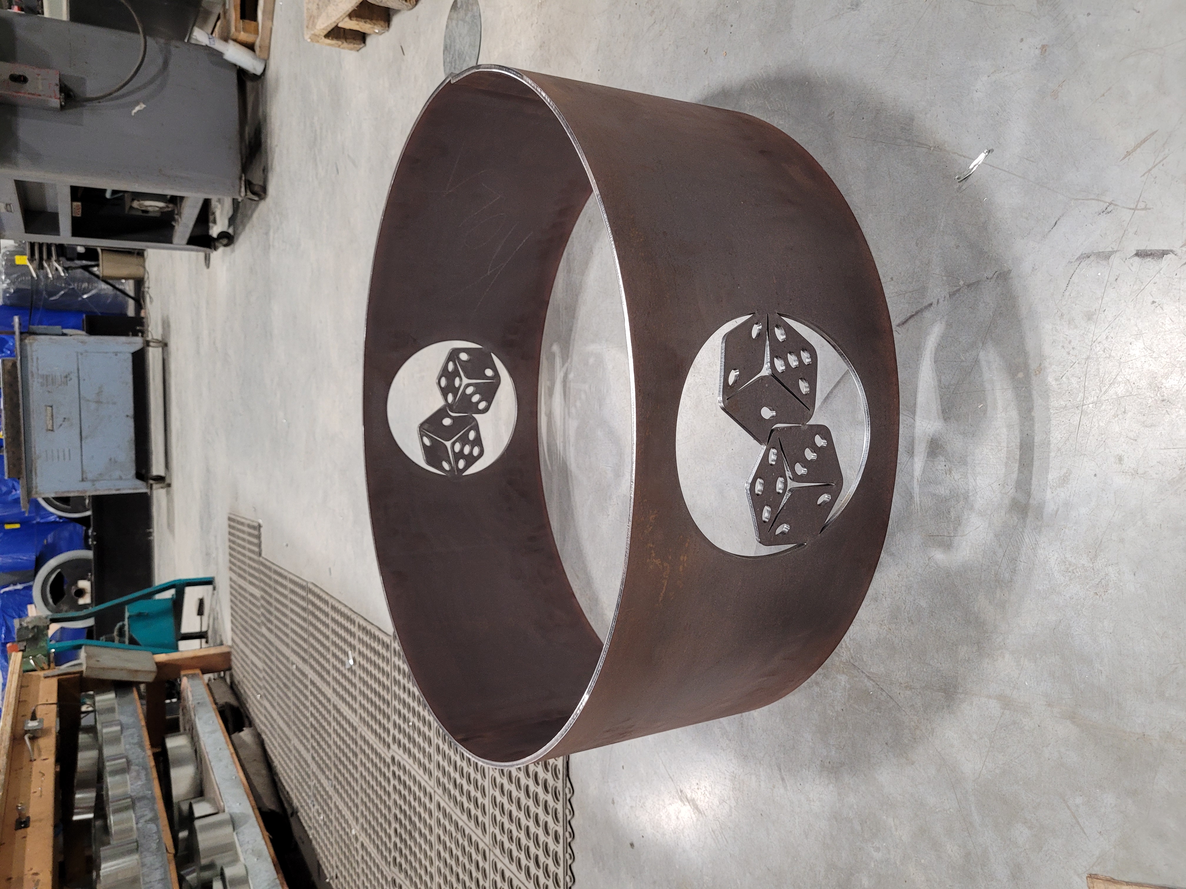 Custom metal fire pit ring with dice cutouts