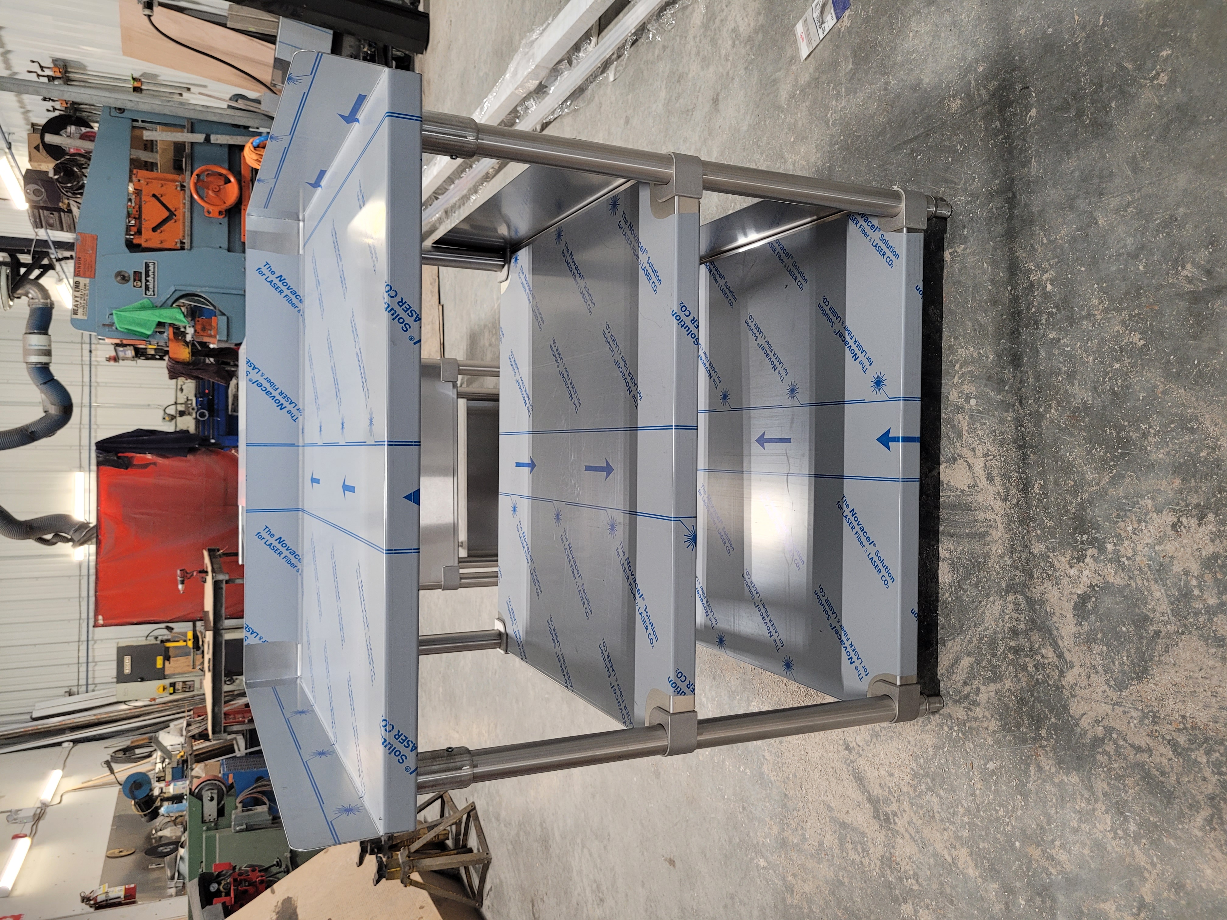 Multi-tiered stainless steel shelving unit